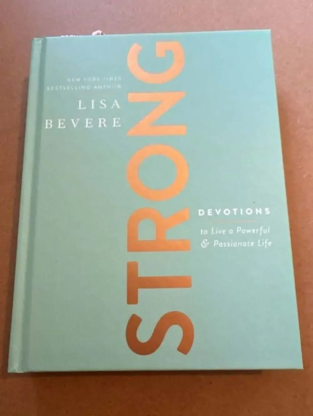 Strong: Devotions to Live a Powerful & Passionate Life by Lisa Bevere (Hardcover